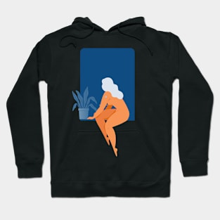 Woman sitting on the window Hoodie